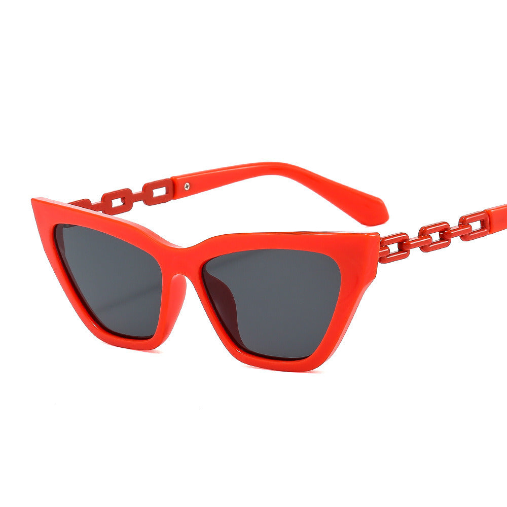 Red Fashion Cay Eye Sunglasses Women Hollow Out Chain Glasses Retro Sunglass Men Brand Designer Eyewear UV400 Sun Glass Clear Shades with UV blocking lenses, isolated on a white background.