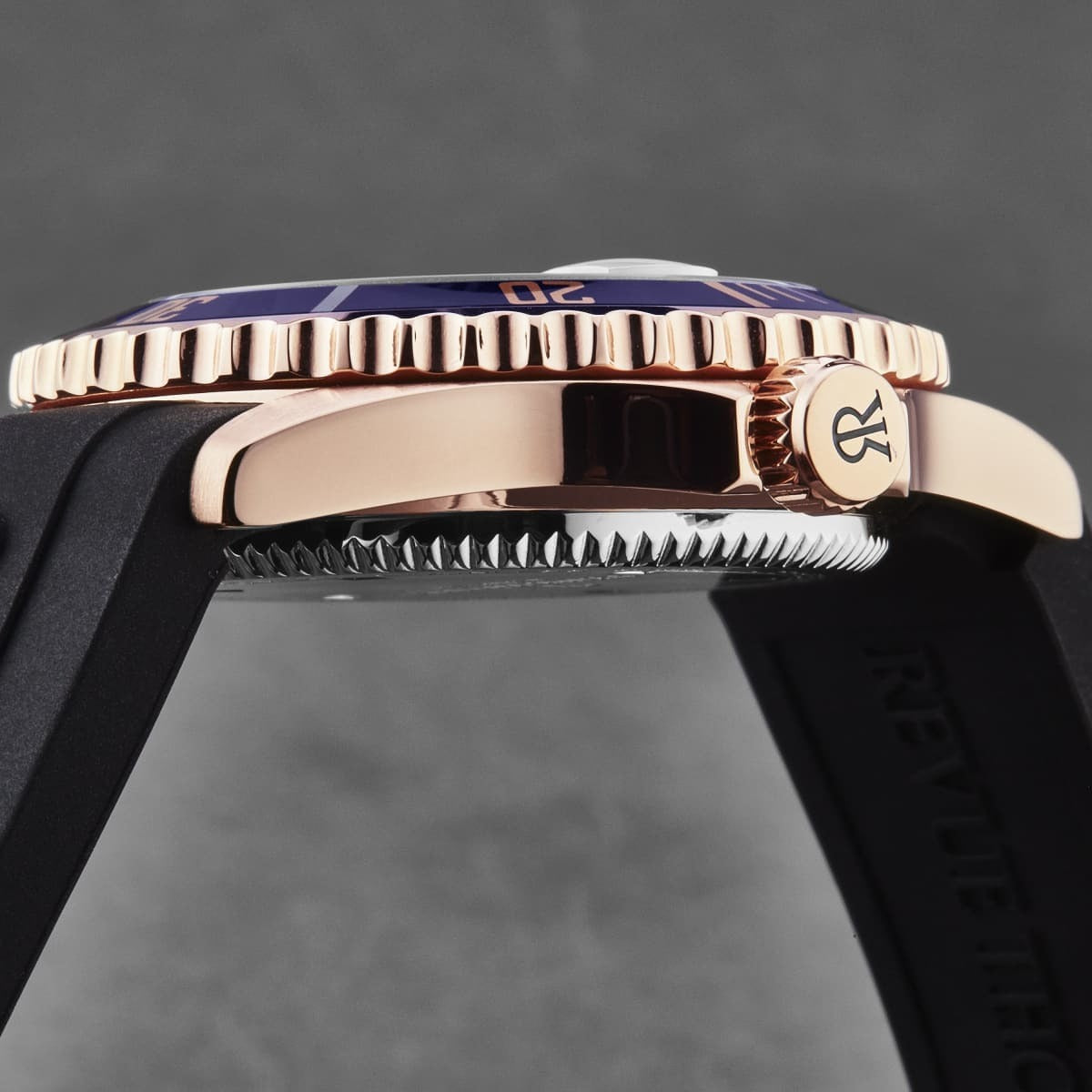 A Revue Thommen Men's 'Diver' Blue Dial Black Rubber Strap Swiss Automatic Watch 17571.2865 with a blue dial and black strap.