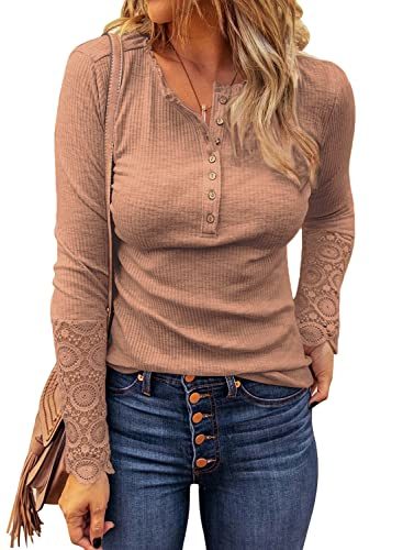 A person is wearing the Womens Ribbed Knit Henley Long Sleeves Tunic Lace Top with a V neck and button detail, paired with blue jeans—perfect for 2022 Fashion Fall Clothes. The person is carrying a brown bag with a tassel strap over their shoulder, embodying the VICHYIE Womens Fashion vibe.