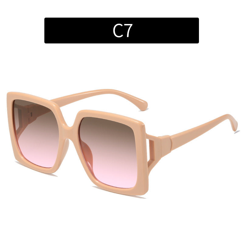 A pair of Fashion Square Sunglasses Women Hollow Out Sunglass Vintage Sun Glass Men Luxury Brand Oversized Eyewear with UV blocking, gradient tinted lenses, isolated on a white background, labeled "c2" above.