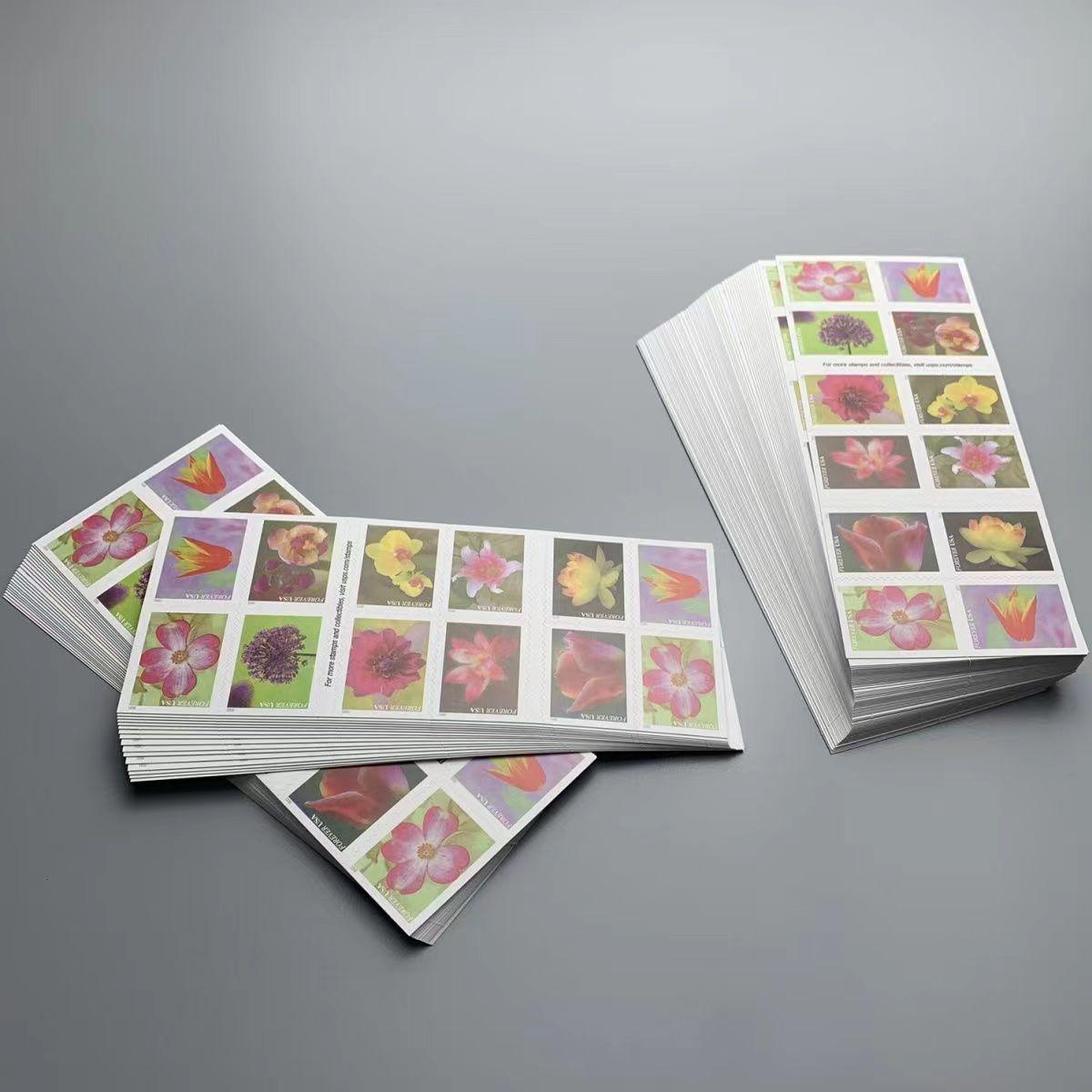 A booklet of "Garden Beauty 2021" USPS First-Class Forever stamps, issued in 2021, featuring various colorful flowers.