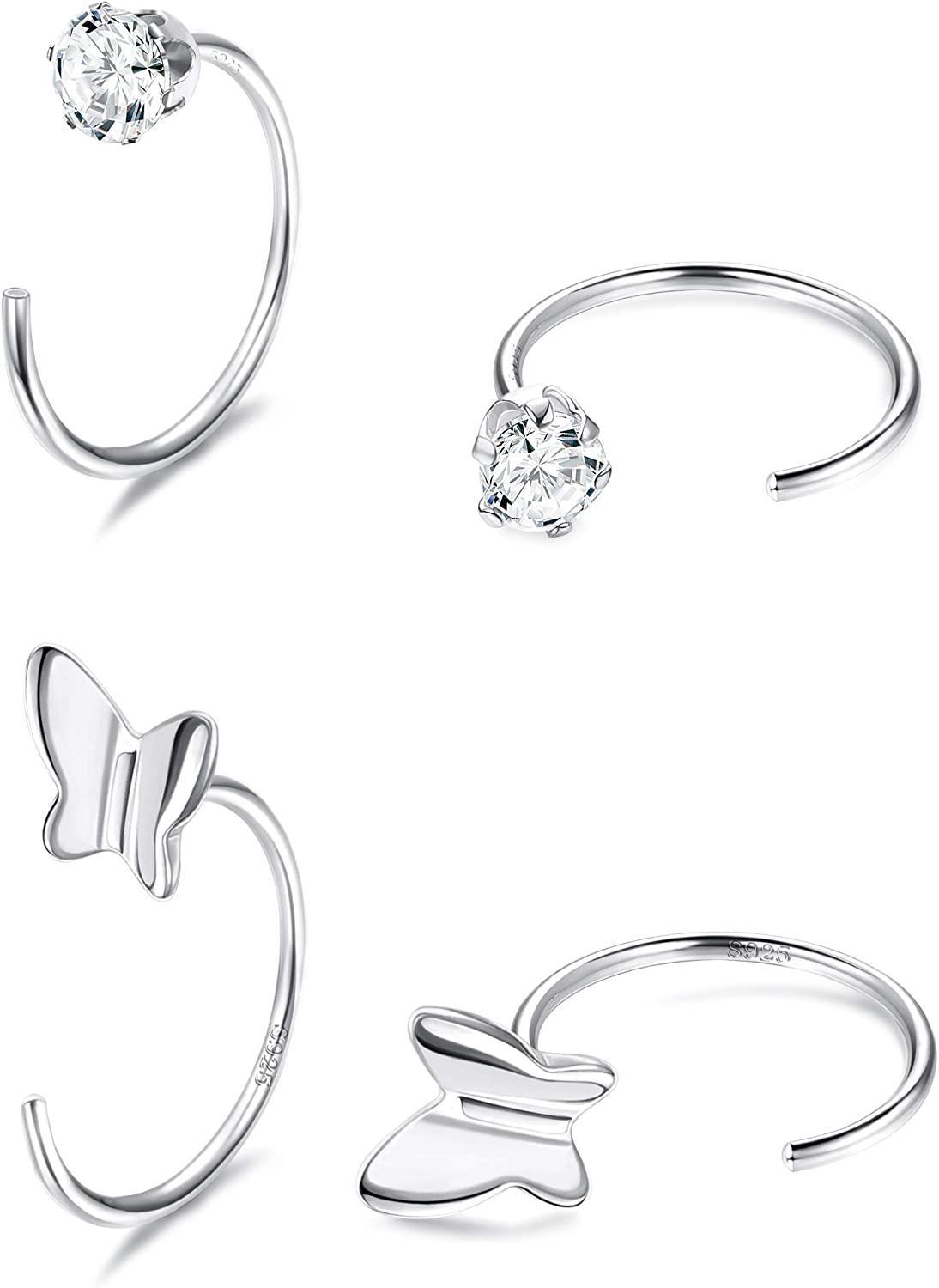 Six 4Pcs Sterling Silver Ball Nose Rings displayed against a white background, including designs with a cubic zirconia, a ball, and butterfly shapes.