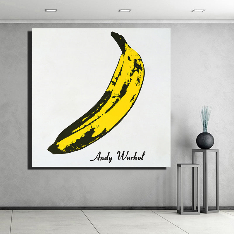 A framed poster of 100% Handmade Abstract Oil Painting Wall Art Modern Minimalist Banana Picture hanging on a modern gallery wall, with a canvas home decorative vase and stand nearby.