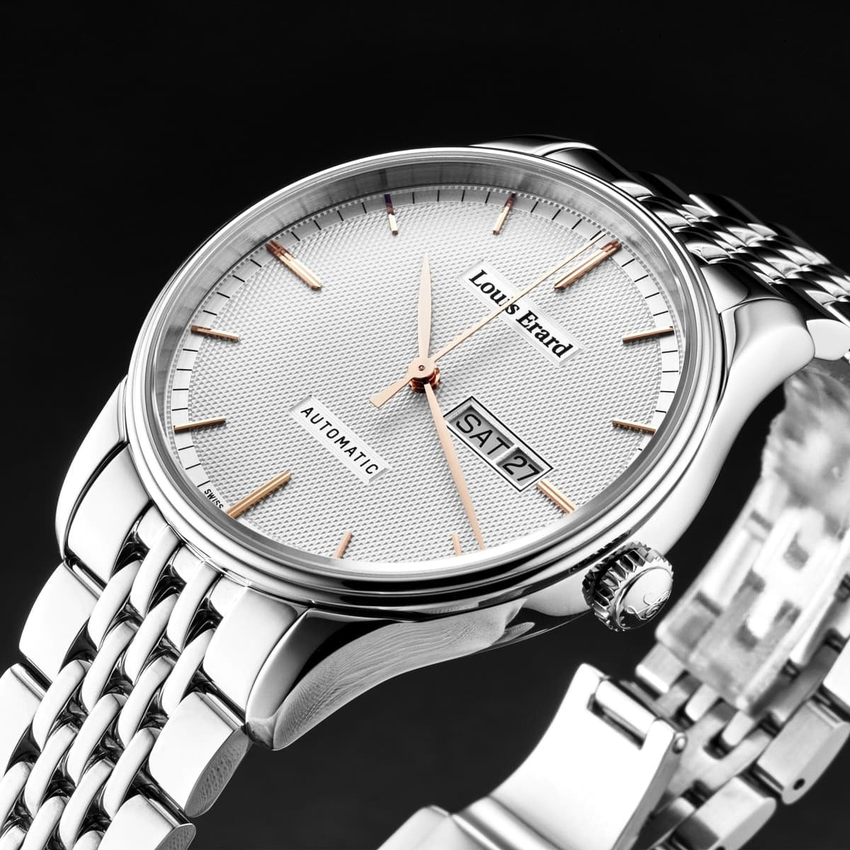 A Louis Erard Men's 'Heritage' Silver Dial Silver Stainless Steel Bracelet Automatic Watch 72288AA31.BMA88 with a silver dial on a white background.