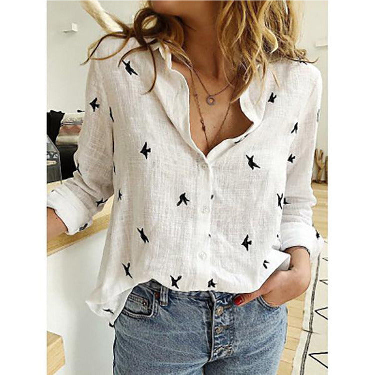 Woman wearing a pink Leisure White Yellow Shirts Button Lapel Cardigan Top with black bird patterns, paired with blue denim jeans, emphasizing the upper body.