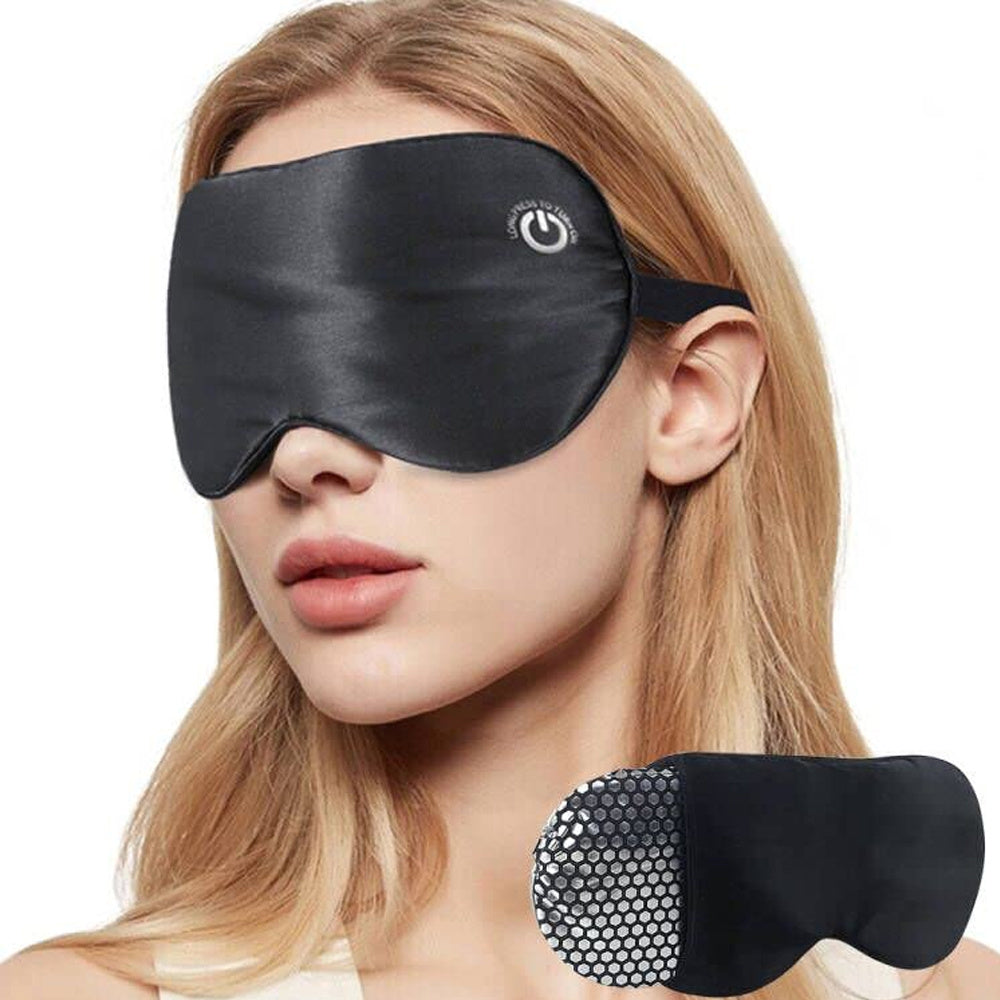 A black New Cordless Heated Eye Mask for Dry Eyes USB Rechargeable Warming Therapy Graphene Heating Reusable Real Silk Sleep Eye Mask with a gold box for relief dry eyes and eye fatigue.