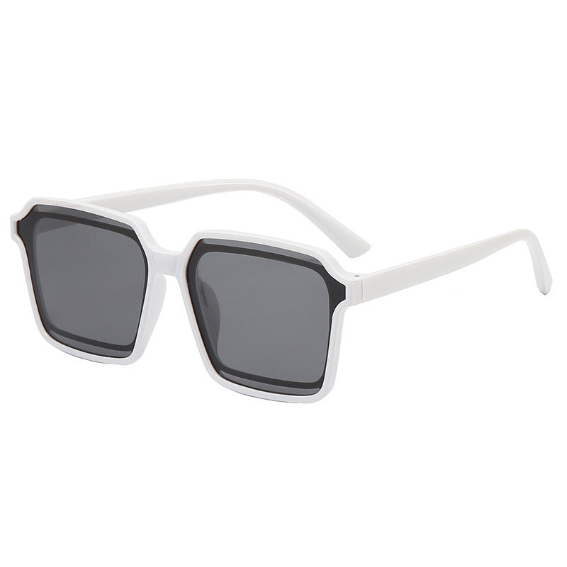 A pair of Fashion Square Sunglasses Women Hollow Out Sunglass Vintage Sun Glass Men Luxury Brand Design Eyewear with UV400 dark lenses and a transparent frame, isolated on a white background.