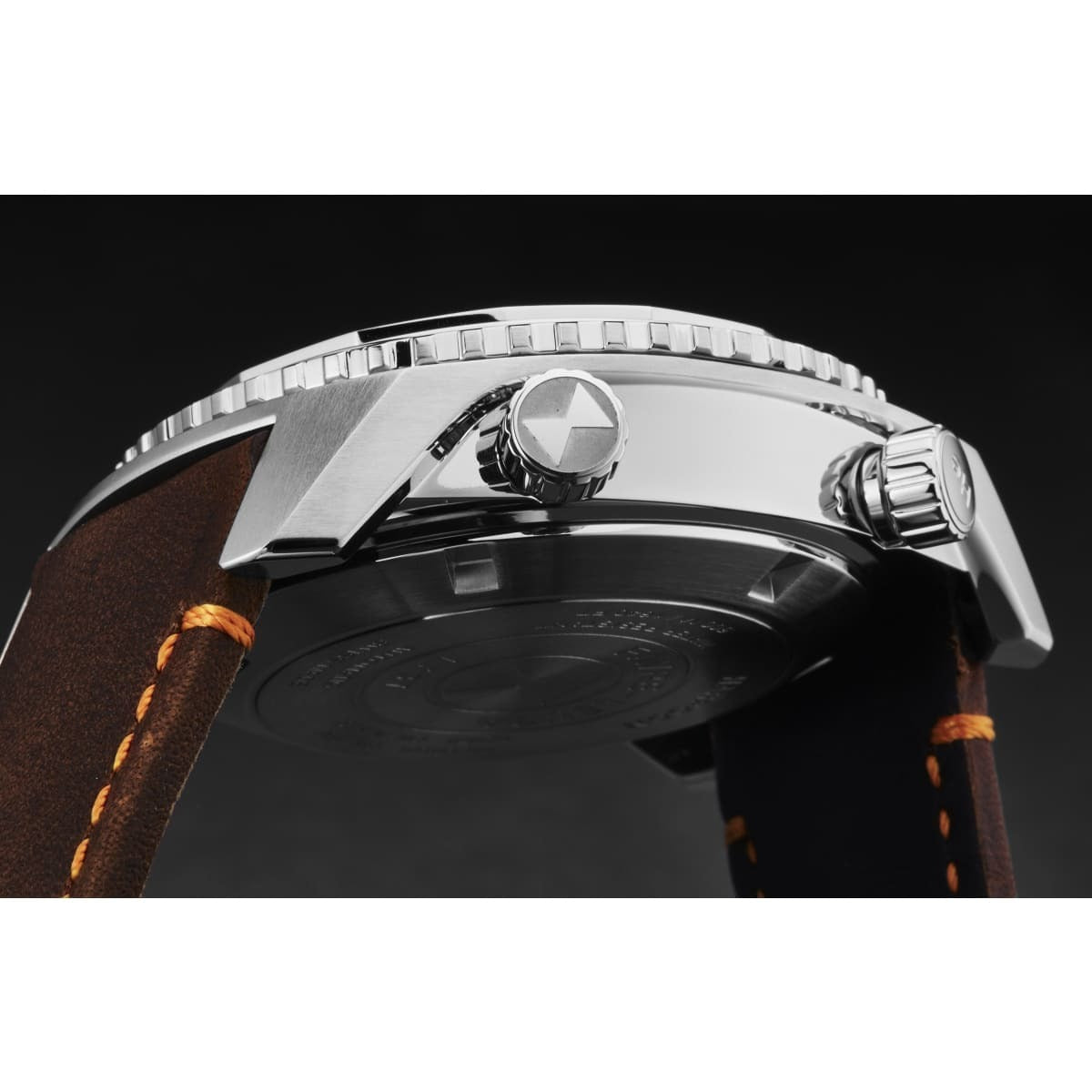 An Favre-Leuba Men's 00.10101.08.13.44 'Raider Harpoon' Black White Dial Brown Leather Strap Automatic Watch, with a black and orange color scheme set against a white background