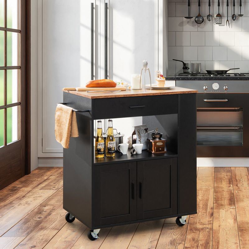 A waterproof Rolling Storage Cabinet Kitchen Cart For Home And Bar Commercial Usage with spacious shelves and bread on it.