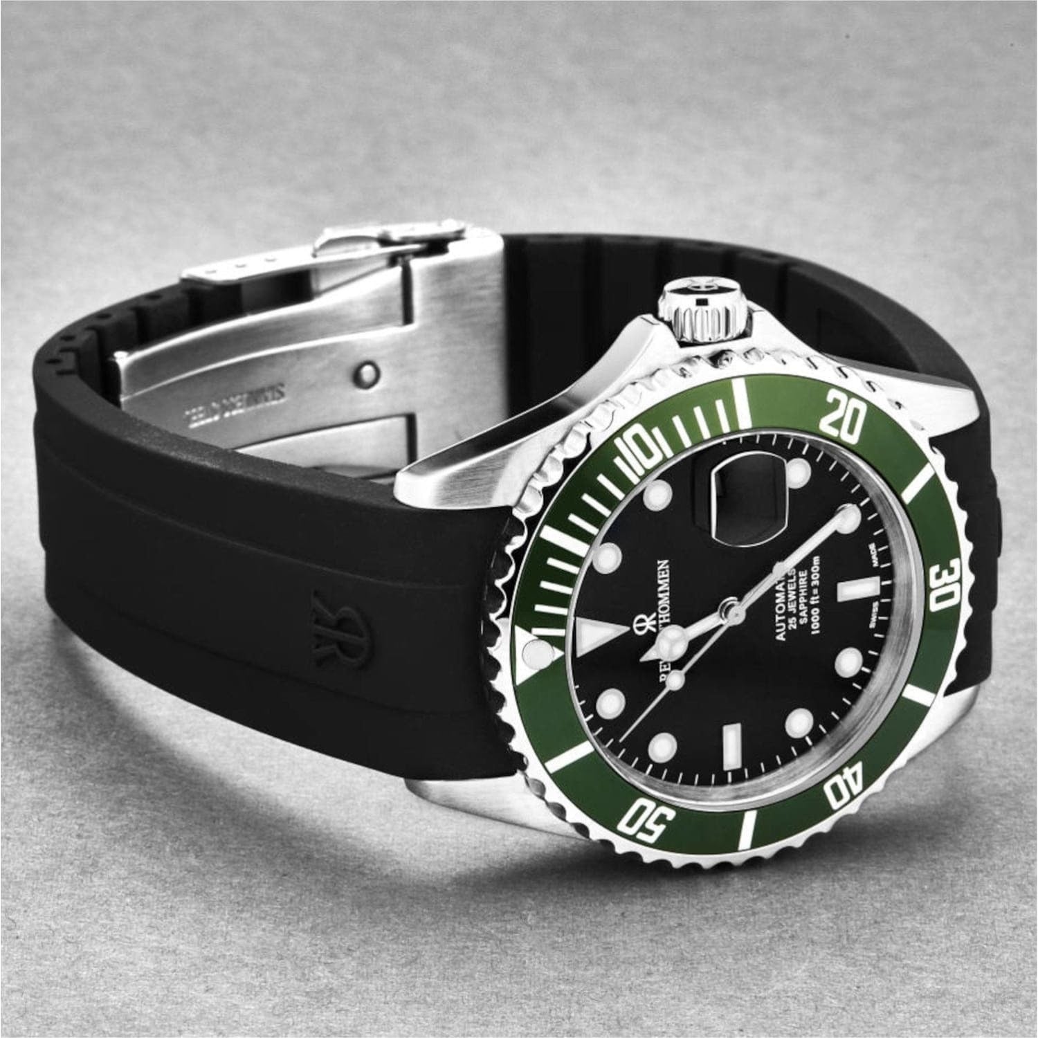 A Revue Thommen 17571.2834 men's 'Diver' Black Dial Rubber Strap Swiss Automatic Watch, featuring a sleek black and green design, showcased against a clean white background.