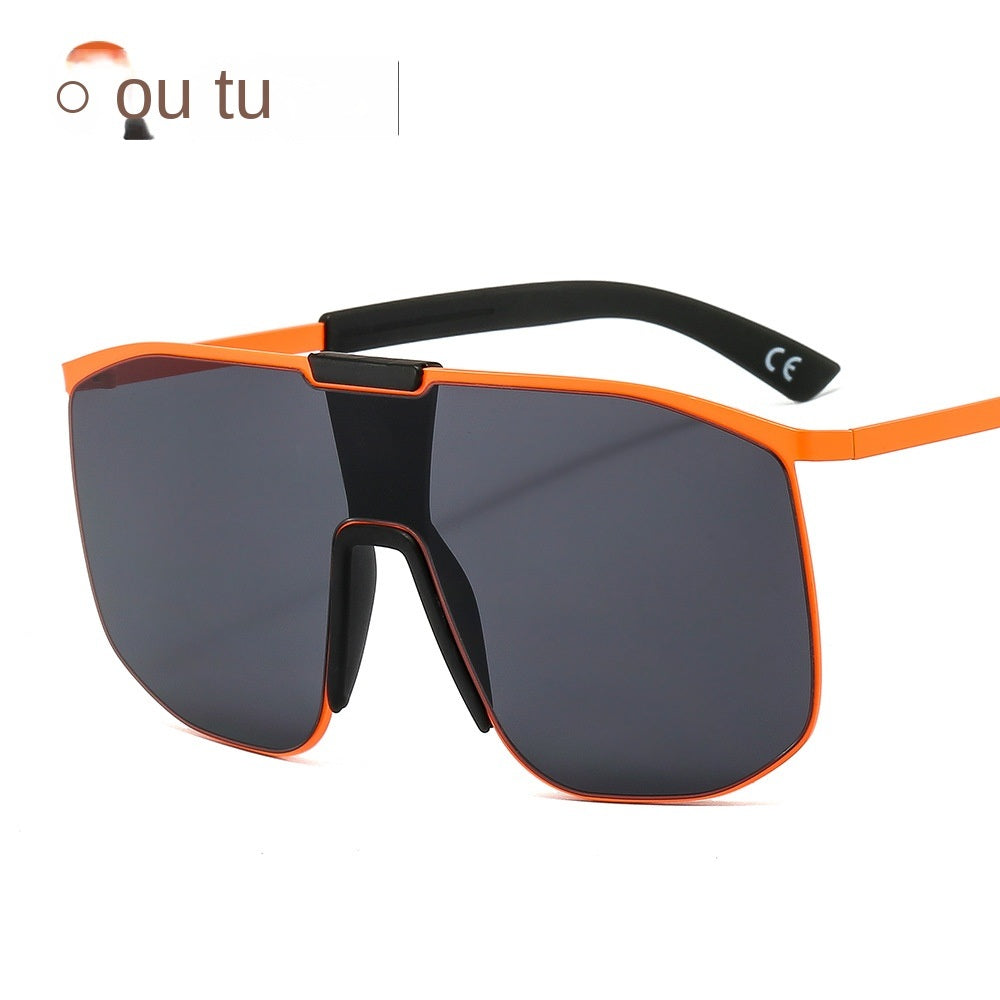 Fashionable and modern color metal one-piece sunglasses for men and women large frame integrated sunglasses with UV400 gradient tint lenses and thin temples, isolated on a white background.