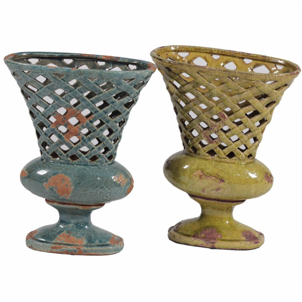 Two antique Ceramic Vases from DunaWest, one in aged turquoise and the other in moss green, showing weathering and patina.