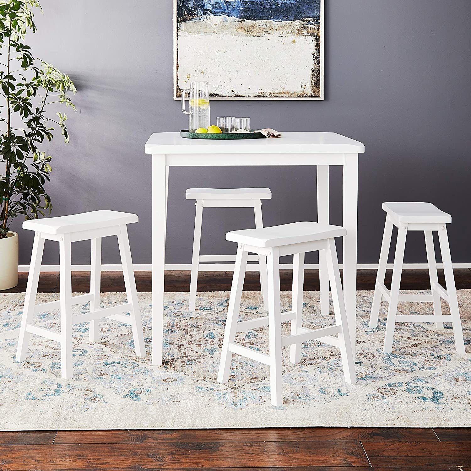 A Gaucho Counter Height Set (5Pc Pk) in White with a square leg table, perfect for small dining spaces, set against a white background.