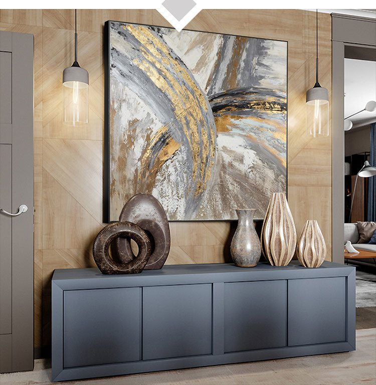 Large Original Hand Painted Abstract Modern Golden Oil Painting On Canvas Wall Art hung on a gray wall in a modern home interior with visible kitchen in the background.