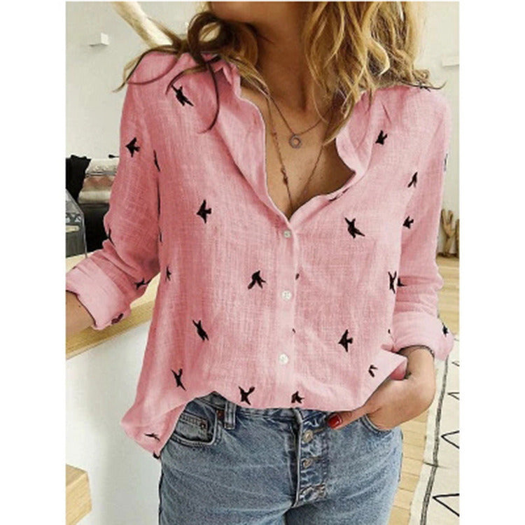 Woman wearing a pink Leisure White Yellow Shirts Button Lapel Cardigan Top with black bird patterns, paired with blue denim jeans, emphasizing the upper body.