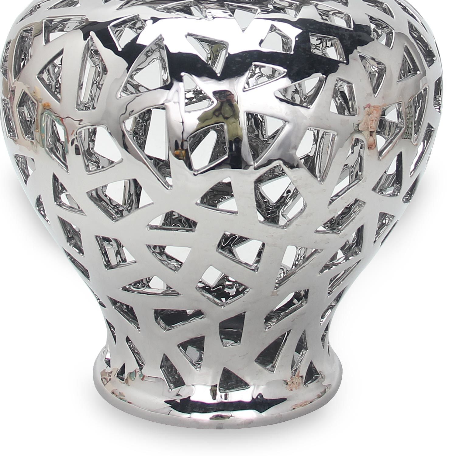 The Silver Ceramic Ginger Jar Vase with Decorative Design is a reflective silver ceramic vase that comes with a fitted decorative lid and features an intricate cut-out pattern. This exquisite piece of home decor adds elegance to any space.