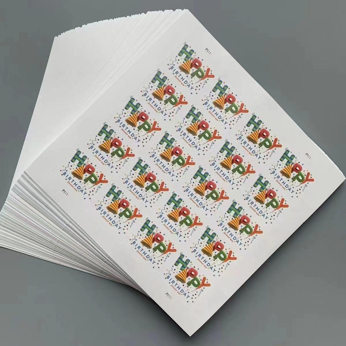A stack of Happy Birthday 2021 - 5 Sheets / 100 Pcs featuring a colorful "happy holidays" design with festive graphical elements from 2021.