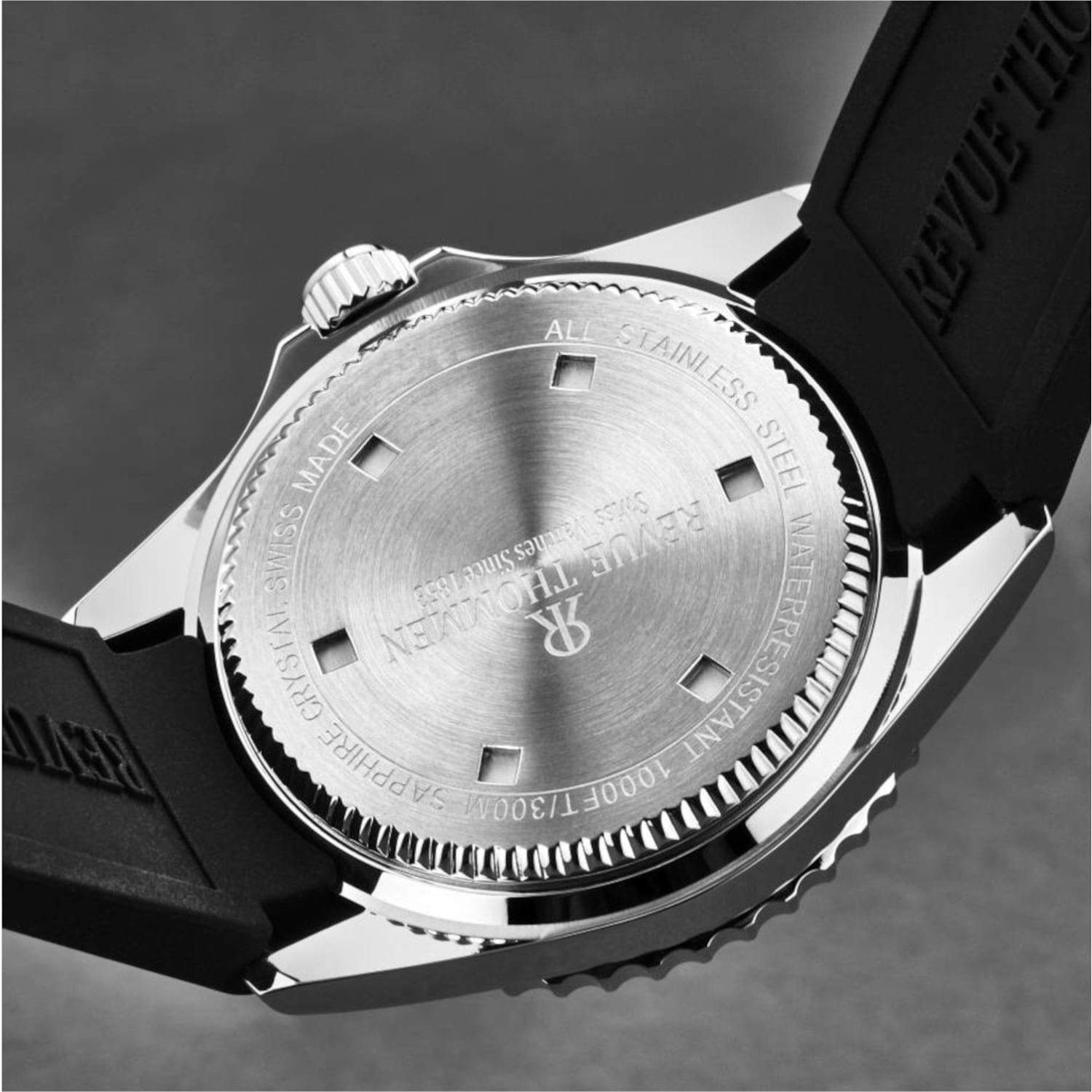 A Revue Thommen 17571.2826 Men's 'Diver' Silver Dial Rubber Strap Swiss Automatic Watch with a rubber strap.