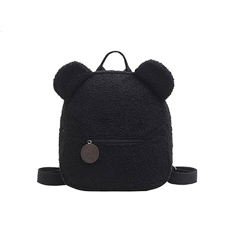 A beige fleece teddy bear backpack with ears, featuring a front zip pocket and adjustable straps. 
Product Name: Personalised Bear Backpacks Custom Name Portable Children Travel Shopping Rucksacks Women's Cute Bear Shaped Shoulder Backpack