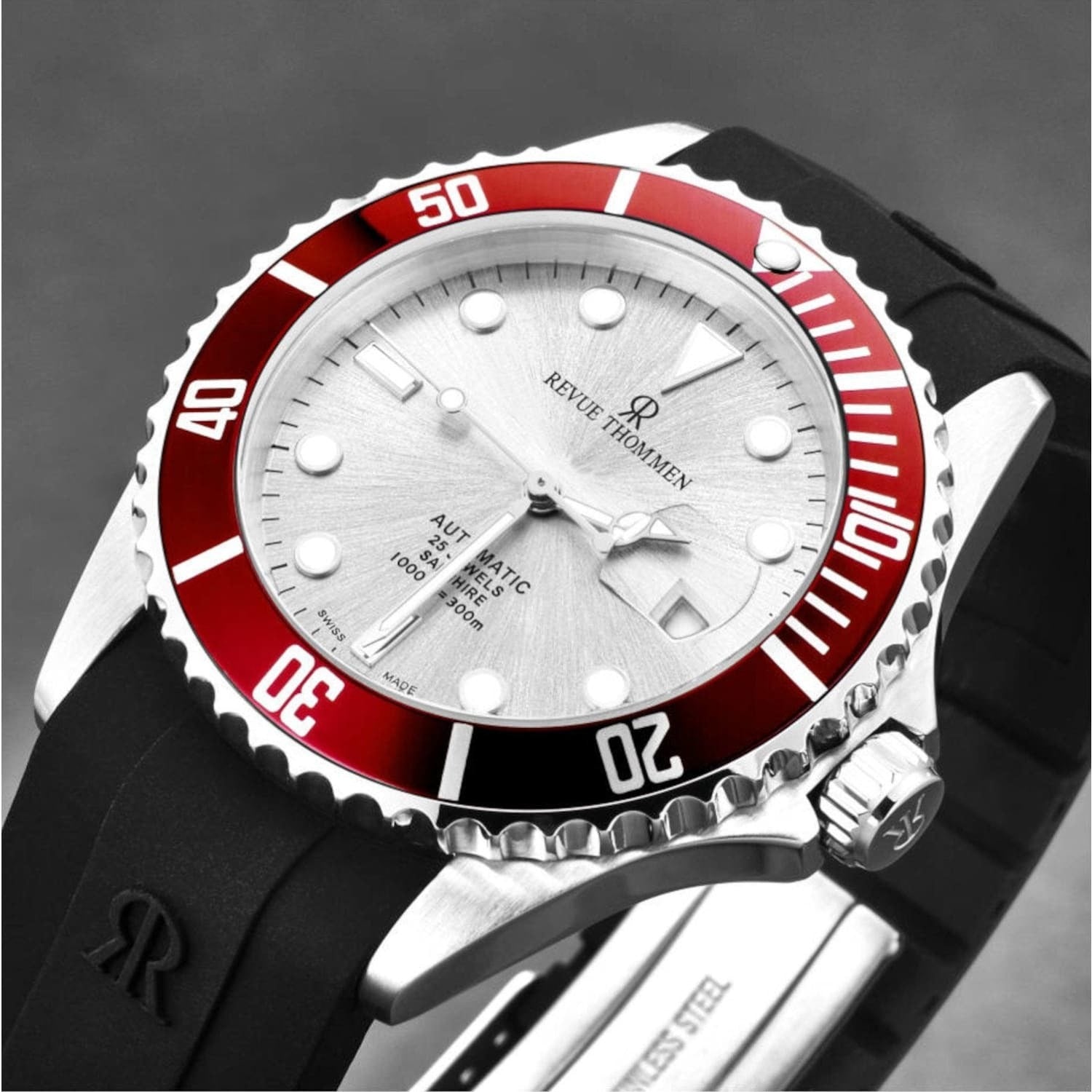 A Revue Thommen 17571.2826 Men's 'Diver' Silver Dial Rubber Strap Swiss Automatic Watch with a rubber strap.