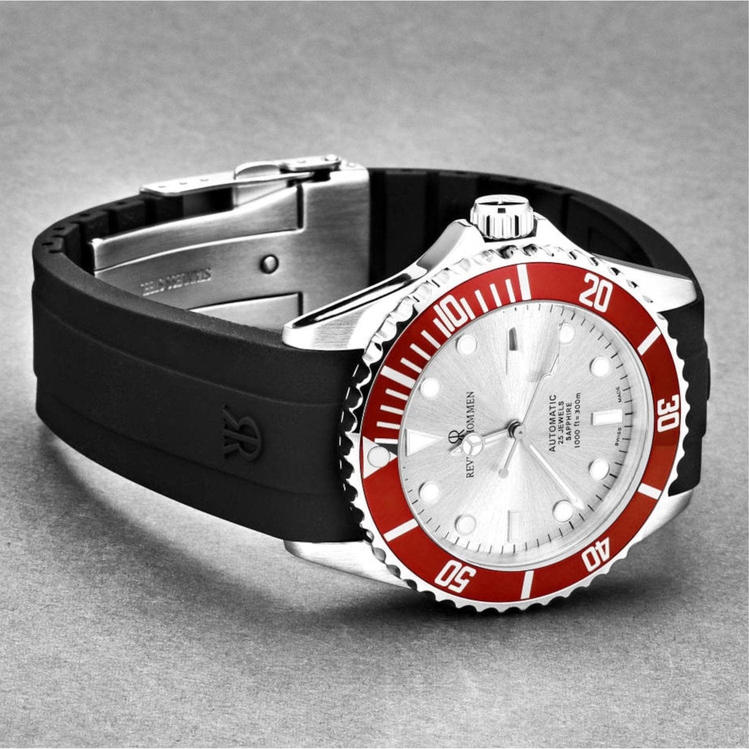 A Revue Thommen 17571.2826 Men's 'Diver' Silver Dial Rubber Strap Swiss Automatic Watch with a rubber strap.