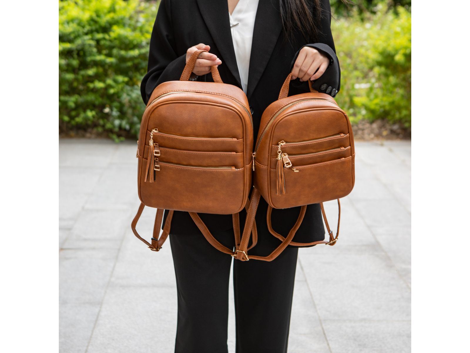 Two MKF Collection Roxane Vegan Leather Women's Backpacks with Mini Backpack and Wristlet Pouch- 3 pieces by Mia k, and a wallet.