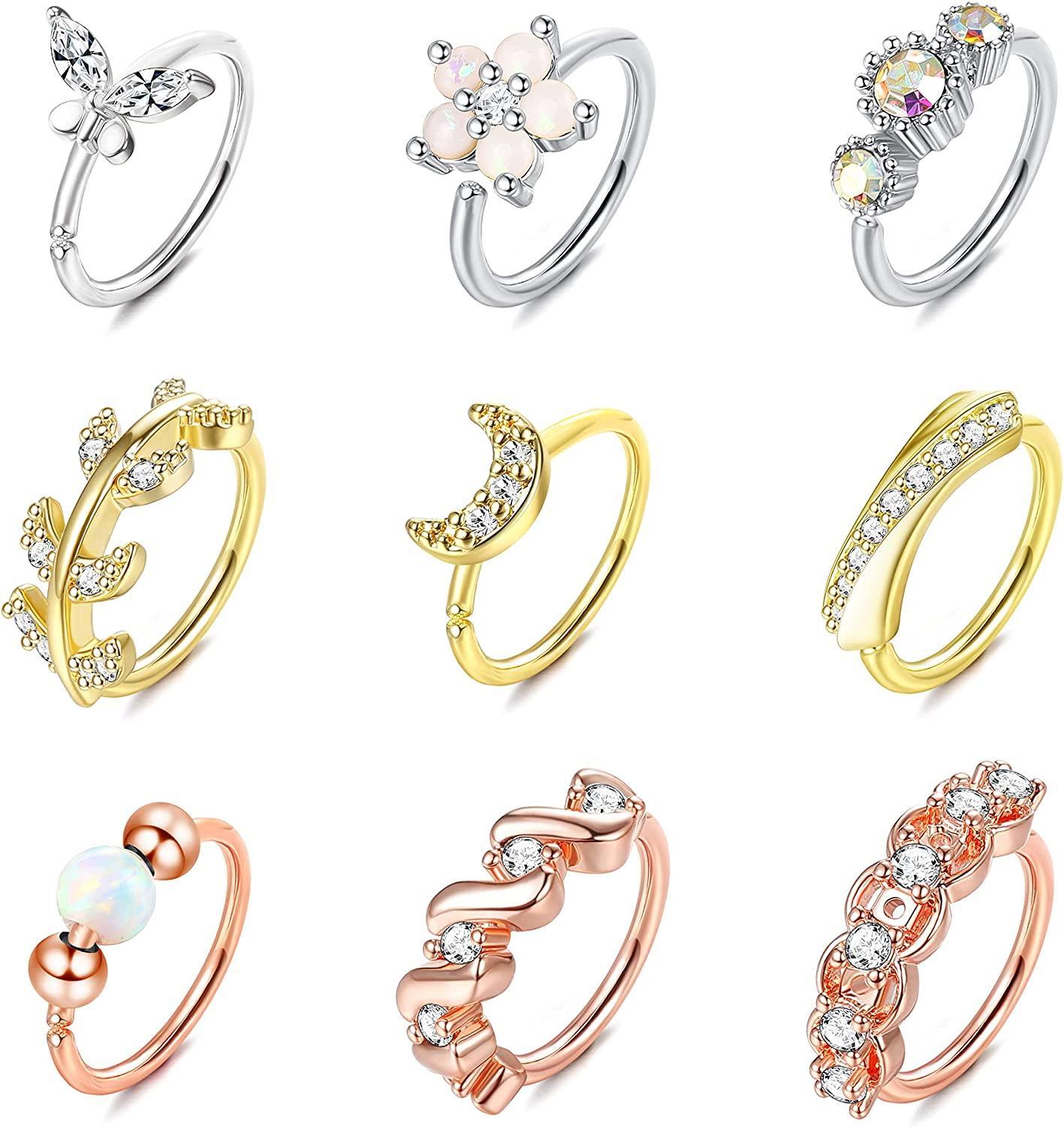 A variety of 9Pcs 20G Stainless Steel Nose Ring Hoop for Women Men in silver, gold, and rose gold tones, each decorated with different elements like pearls, crystals, floral motifs, and cartilage hoop rings.