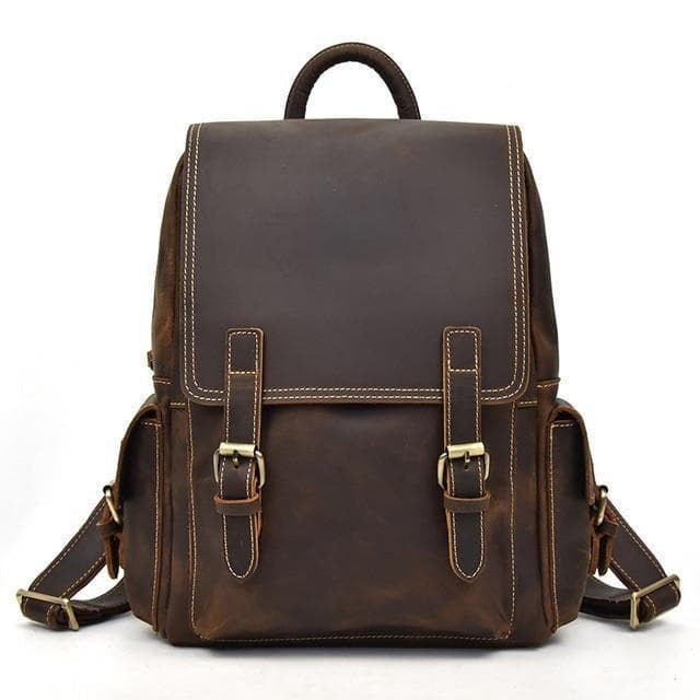 The Freja Backpack | Handcrafted Leather Backpack is a high-quality leather travel backpack with buckles and straps.