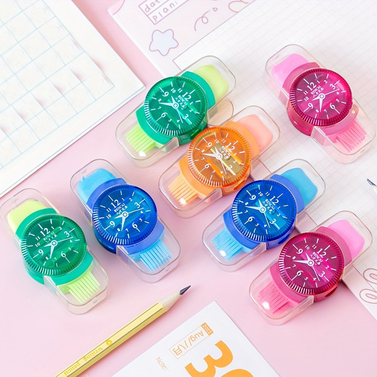 Four 4pcs Creative Watch Shape Pencil Sharpeners with translucent bands are elegantly displayed in a row against a light background. Each sharpener features a distinctively colored strap and matching dial, designed to complement any outfit stylishly.