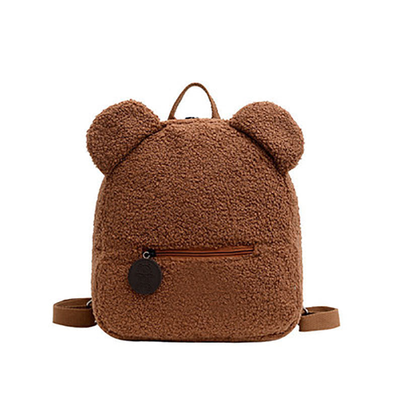 A beige fleece teddy bear backpack with ears, featuring a front zip pocket and adjustable straps. 
Product Name: Personalised Bear Backpacks Custom Name Portable Children Travel Shopping Rucksacks Women's Cute Bear Shaped Shoulder Backpack