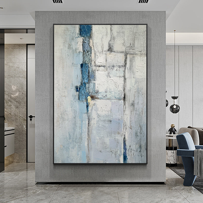 Abstract oil painting with blue and white tones hung on a Canvas Posters and Prints Gray Marble Prints Abstract Gold Line Nordic Wall Art Agate Painting Pictures For Living Room Decor in a modern room with minimalist furniture.