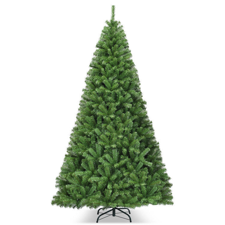 An eye-catching man is standing next to a 6/7.5/9ft Premium Artificial Hinged PVC Christmas Tree with Metal Stand.