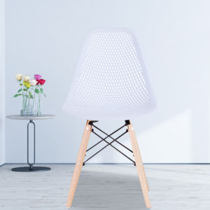 The Set of 4 Modern Style Dining Chairs are mid-century modern side chairs with a black plastic shell lounge design, wooden walnut legs, and metal supports, perfect for your kitchen, dining room, bedroom, or living room.