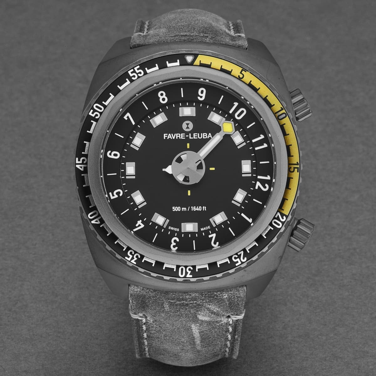 A black and yellow FavreLeuba Men's 00.10121.10.14.45 'Raider Harpoon' automatic watch on a white background.