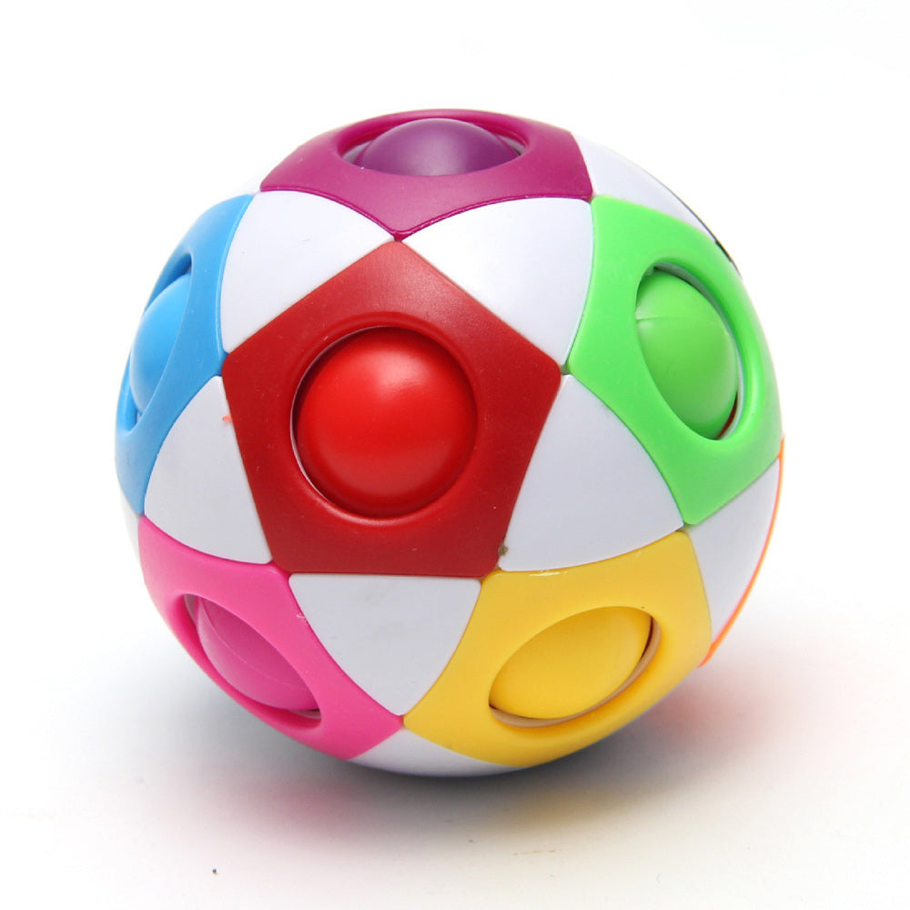 Rainbow Puzzle Ball: A vibrant jigsaw ball placed on a pristine white surface.
