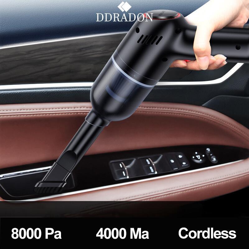 An individual efficiently utilizes the 8000Pa Wireless Car Vacuum Cleaner Cordless Handheld Auto Vacuum Home &amp; Car Dual Use Mini Vacuum Cleaner With Built-in Battrery to perform interior cleaning, emphasizing the importance of maintaining cleanliness for optimal car maintenance.