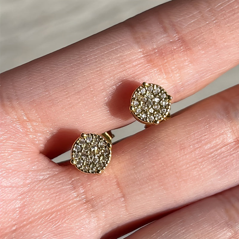 Details: A pair of Fancy Round Shaped Stud Earrings Paved Shiny CZ Stone Silver Color/Golden Everyday Fashion Versatile Ear Jewelry featuring a circular, diamond-encrusted design on a dark background.