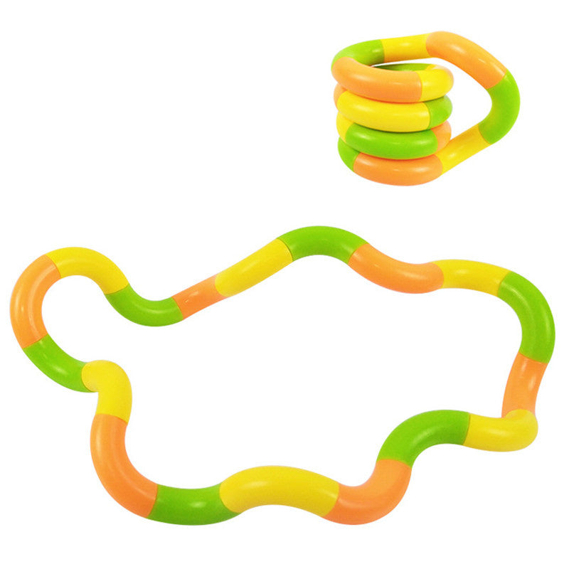 Four colorful plastic rings intertwined, each featuring a vibrant combination of bright colors such as blue, green, red, yellow, and purple.