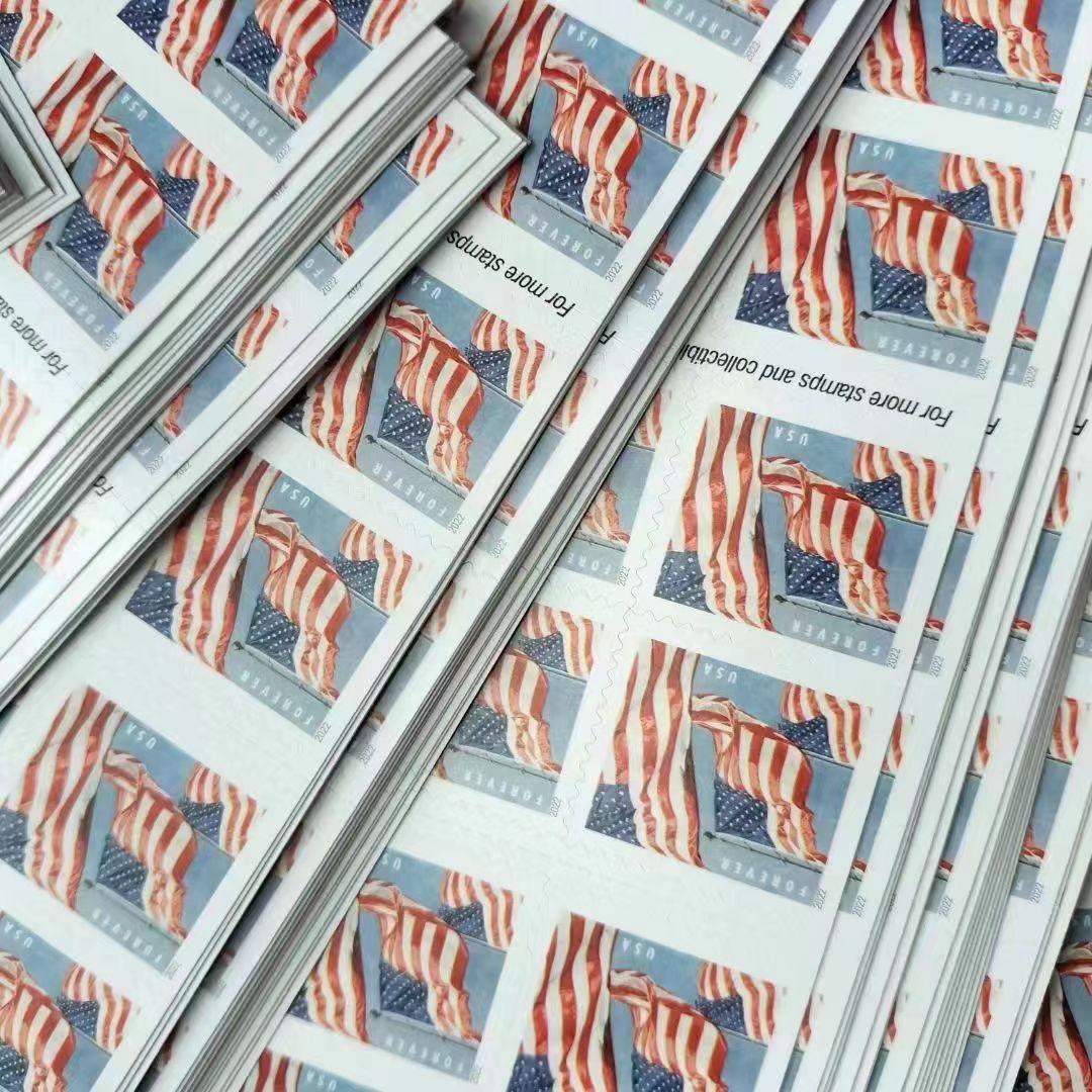 Sheet of Flag 2022 - 5 Booklets / 100 Pcs postage stamps from a booklet with the label "© 2022 USPS," and a single cutout stamp showing the price as "forever USA.