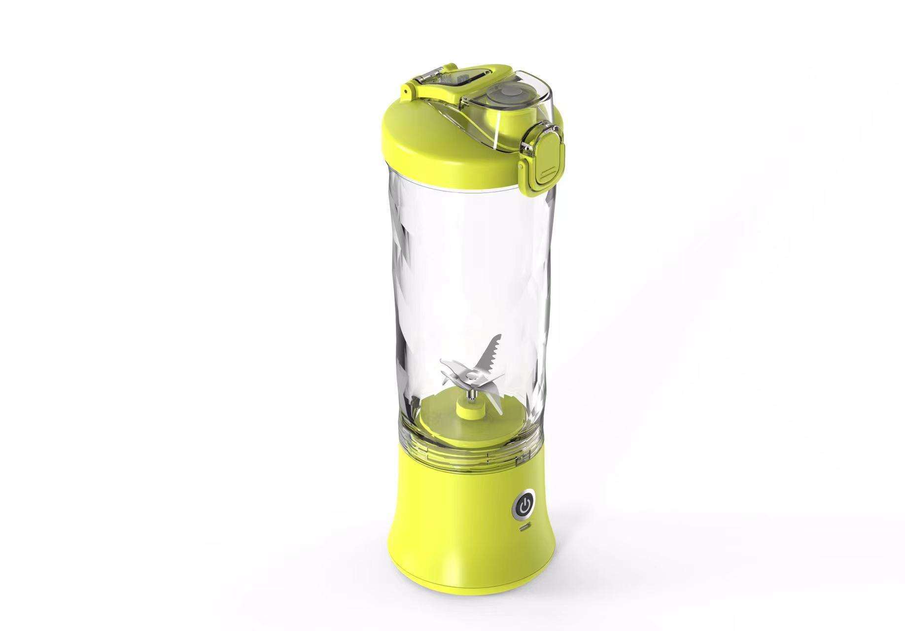 Transparent electric Dual-purpose Juicing Cup with a green base and lid, featuring stainless steel blades and a central blending shaft, along with an on/off button at the front.