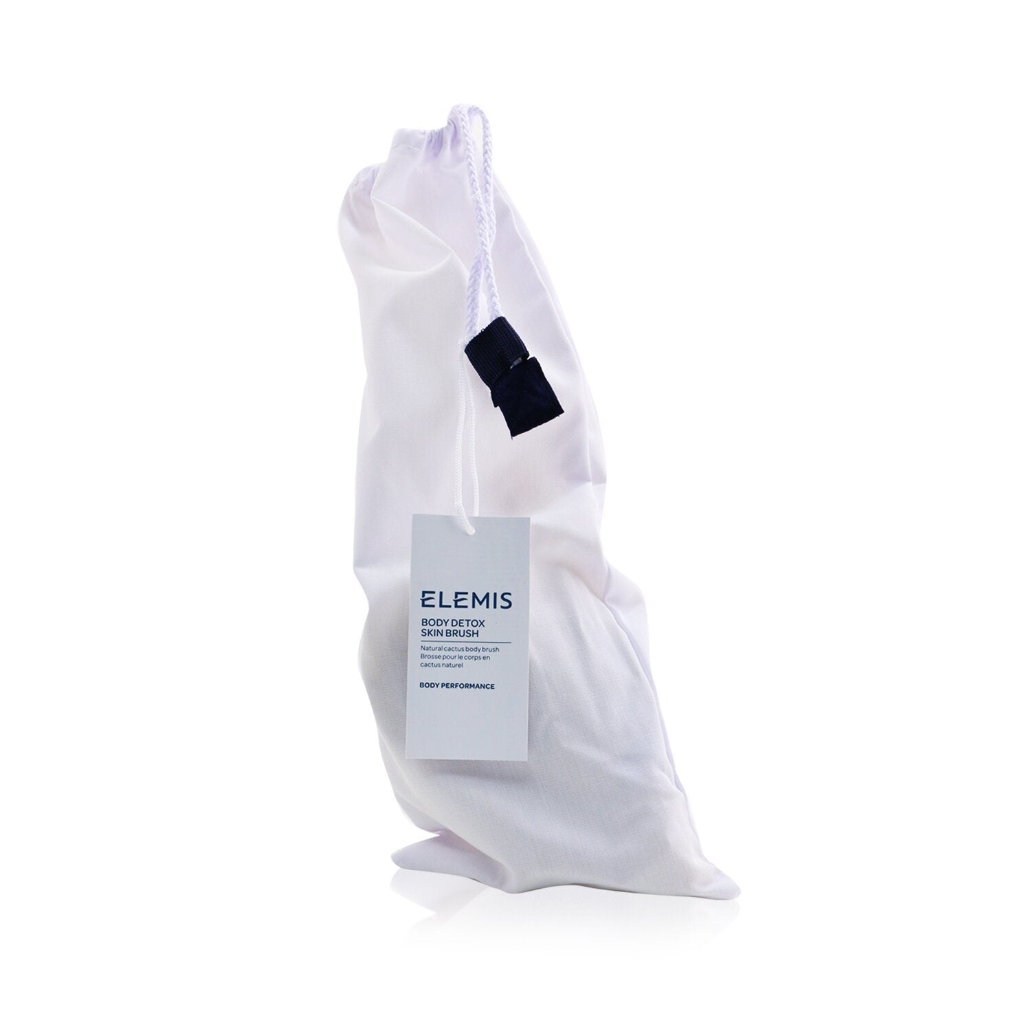 A Body Detox Skin Brush with a plastic bag next to it, ideal for improving skin texture and reducing cellulite.