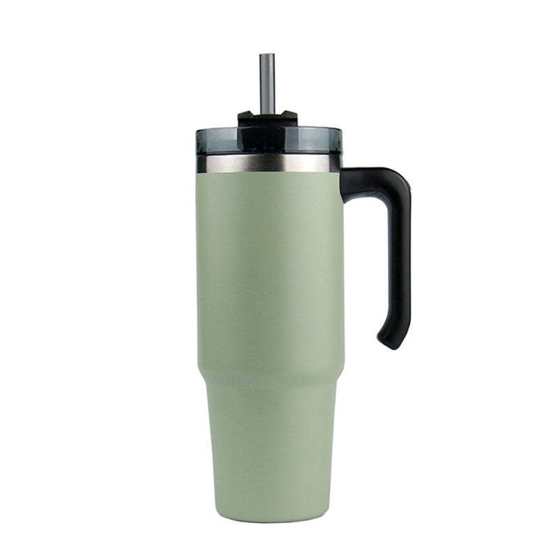 A black insulated 30oz travel car thermo mug with a stainless steel rim and handle, featuring a lid and a straw.