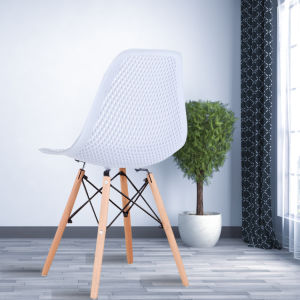 The Set of 4 Modern Style Dining Chairs are mid-century modern side chairs with a black plastic shell lounge design, wooden walnut legs, and metal supports, perfect for your kitchen, dining room, bedroom, or living room.