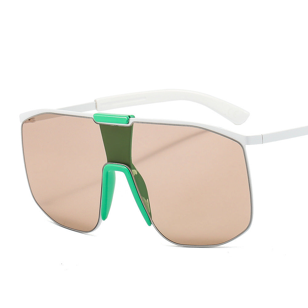 Fashionable and modern color metal one-piece sunglasses for men and women large frame integrated sunglasses with UV400 gradient tint lenses and thin temples, isolated on a white background.