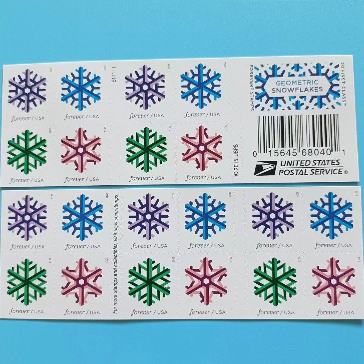 A sheet of Geometric Snowflakes 2015 postage stamps with colorful geometric snowflake designs against a light blue background.