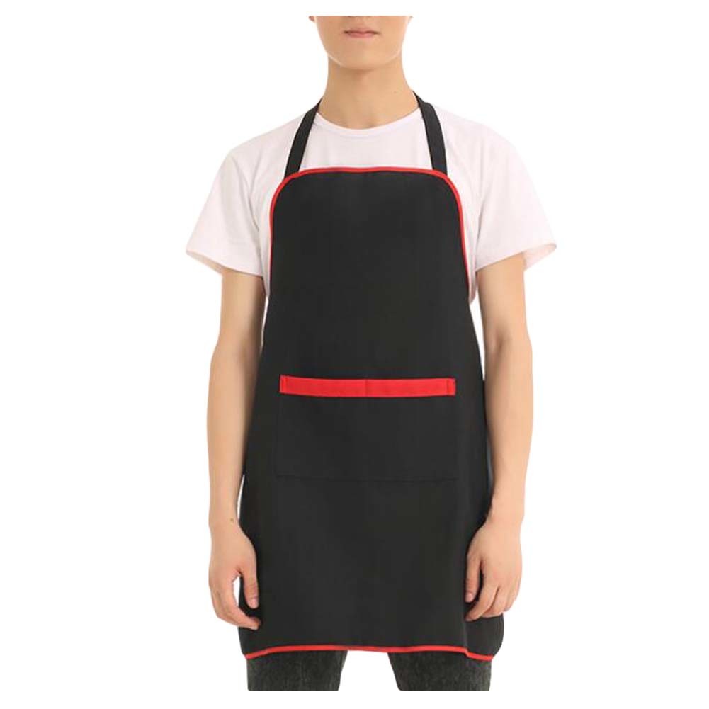 In the kitchen, a man wearing a [Black] Durable Aprons Cafe Aprons Sleeveless Working Apron for Men, 30.7 inches with red trim handles spills.