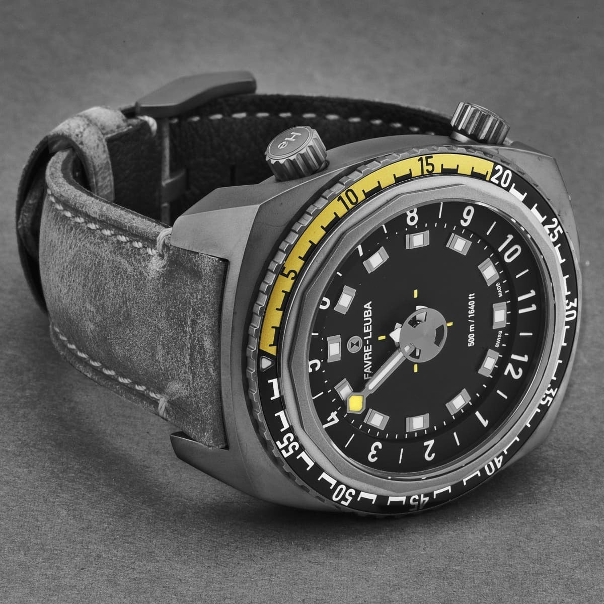 A black and yellow FavreLeuba Men's 00.10121.10.14.45 'Raider Harpoon' automatic watch on a white background.