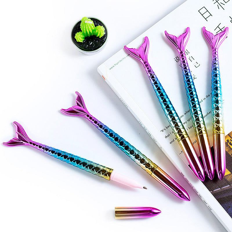 Five colorful 5 Pcs Mermaid Design Ballpoint Pens arranged in a row on a white background.