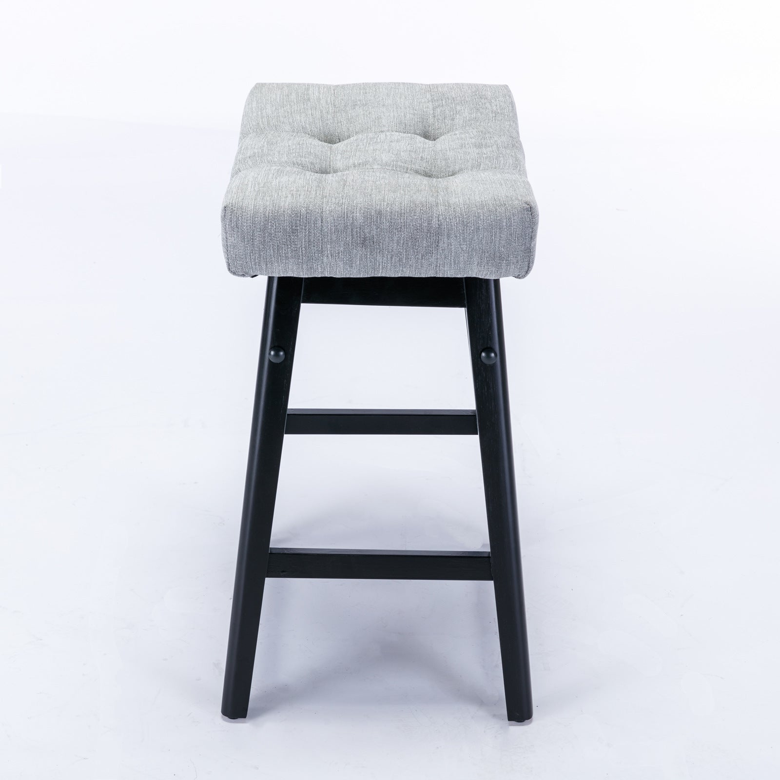 Two A&A Furniture, Counter Height 25" Stools for Kitchen Counter Backless Faux Leather Stools Farmhouse Island Chairs (25 Inch, Gray, Set of 2), SW1838GY in a room with a wooden table.