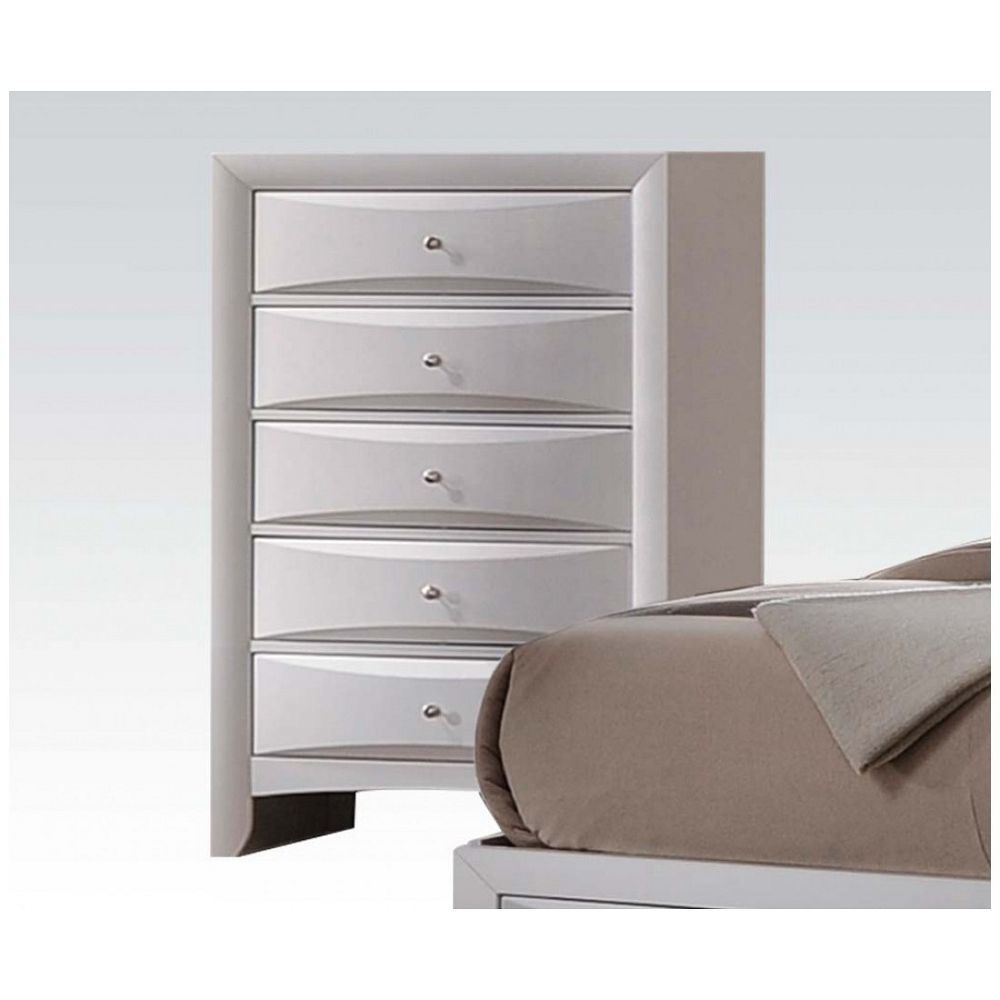 The Ireland Chest in White YJ in a bedroom provides ample storage space for foldable clothes.